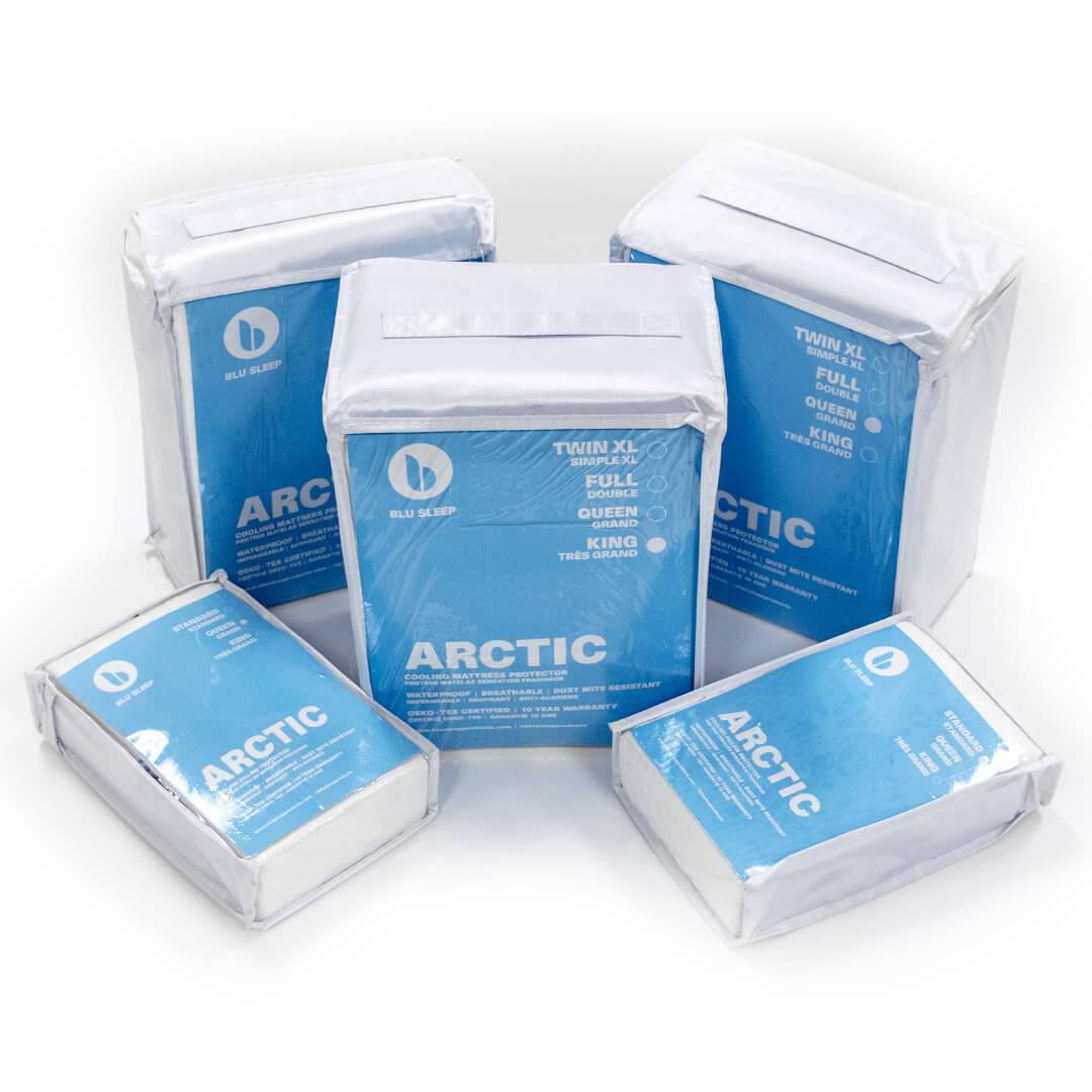 Three Artic Cooling Bedface mattress protectors including two Artic Cooling pillow protectors in plastic and blue zip up packaging with handles that say 'Blu Sleep' with logo in various bed sizes to be used on twin, queen, or king mattresses