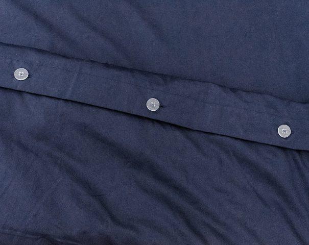 close up of duvet cover in Nighttime Navy with clear buttons
