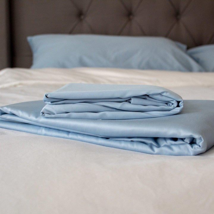 Special Edition Island of Bryan Bahama Blue Bedface Sheet set and a White Bedface duvet cover