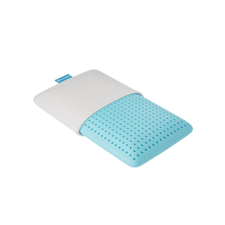 IceGel pillow with cooling properties half in case, half with foam showing, label on end of pillow casing