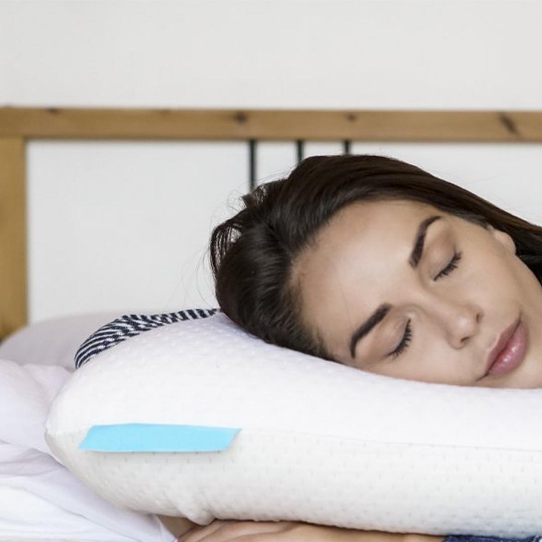 woman sleeping on a Bedface Biogel 4 in 1 pillow with her hands tucked under the pillow